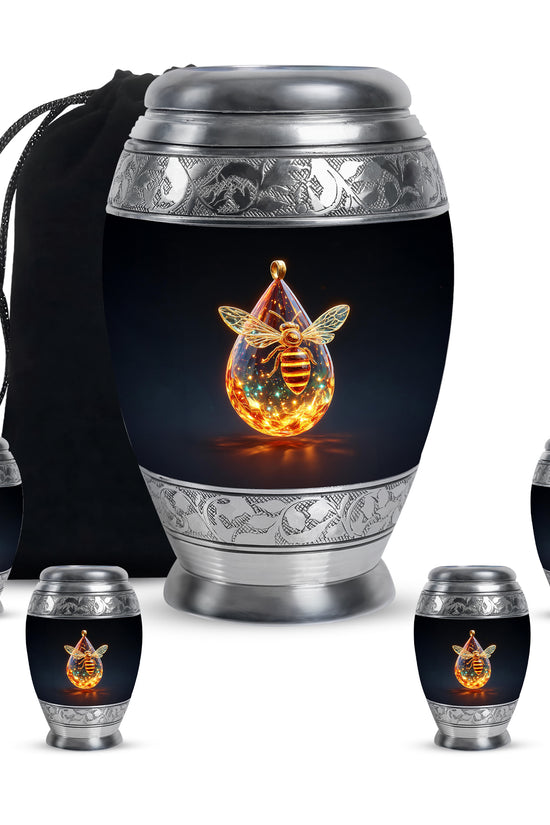 Deep Black Bee Cremation Urn detail view - ornate monarch-style bee relief on brushed aluminum - memorial set with one large and four small urns