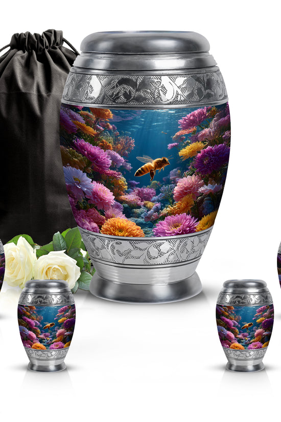 Navy Blue Bee Cremation Urn detail view - ornate monarch-style bee relief on brushed aluminum - memorial set with one large and four small urns