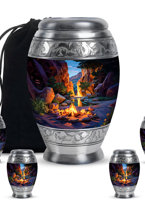 Indigo Campfire Cremation Urn detail view - ornate monarch-style campfire relief on brushed aluminum - memorial set with one large and four small urns