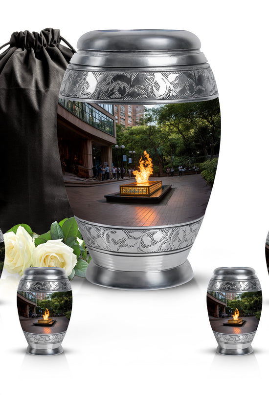 Charcoal Black Campfire Cremation Urn detail view - majestic campfire pattern with filigree border - memorial set with one large and four small urns
