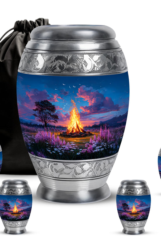 Icy Blue Campfire Cremation Urn detail view - ornate monarch-style campfire relief on brushed aluminum - memorial set with one large and four small urns