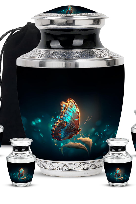 Onyx Black Butterfly Cremation Urn lifestyle display on memorial shelf - stylized abstract butterfly pattern with bold lines - memorial set with one large and four small urns