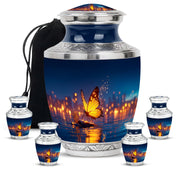 Twilight Blue Butterfly Cremation Urn lifestyle display on memorial shelf - stylized abstract butterfly pattern with bold lines - memorial set with one large and four small urns