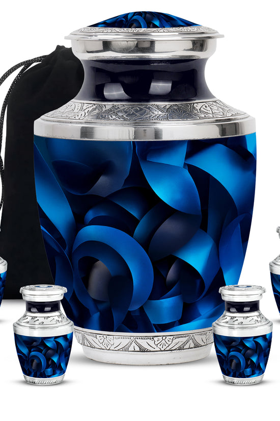 Obsidian Black Blue Cremation Urn lifestyle display on memorial shelf - stylized abstract blue pattern with bold lines - memorial set with one large and four small urns
