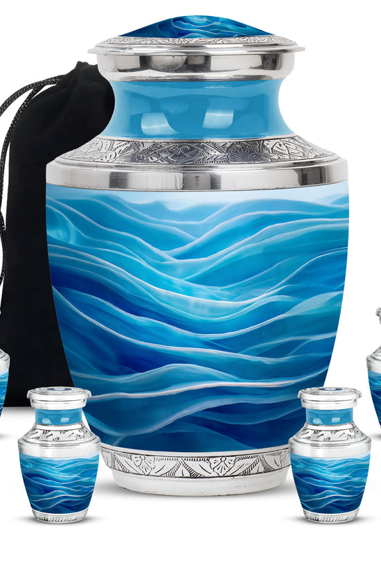 Icy Blue Blue Cremation Urn lifestyle display on memorial shelf - modern art-inspired blue motif on sleek aluminum - memorial set with one large and four small urns