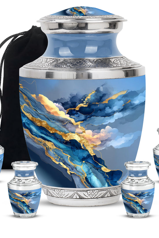 Dusty Blue Blue Cremation Urn lifestyle display on memorial shelf - contemporary blue design with modern artistic flair - memorial set with one large and four small urns