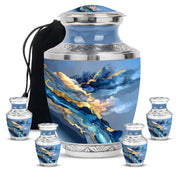 Dusty Blue Blue Cremation Urn lifestyle display on memorial shelf - contemporary blue design with modern artistic flair - memorial set with one large and four small urns
