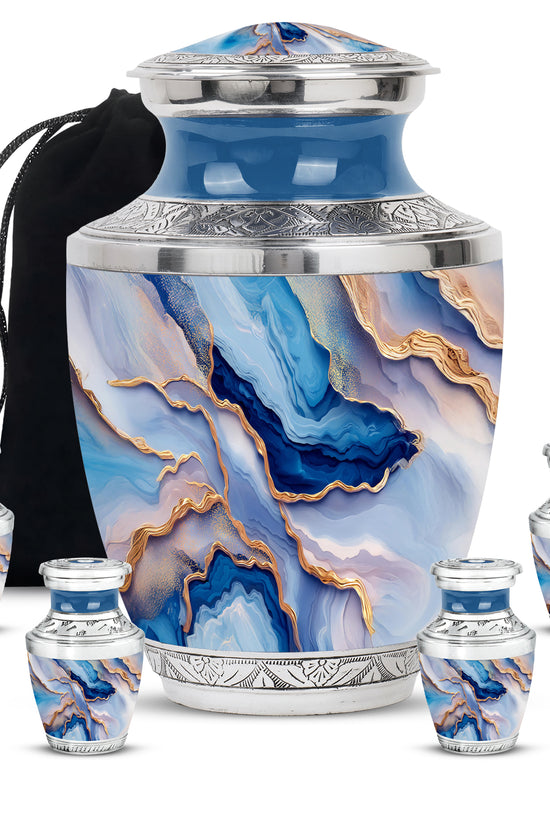 Twilight Blue Blue Cremation Urn lifestyle display on memorial shelf - artistic blue interpretation with creative detail - memorial set with one large and four small urns