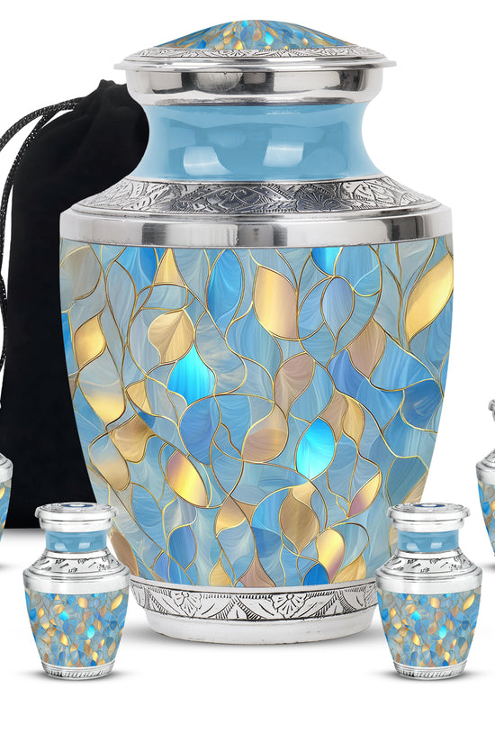 Royal Blue Blue Cremation Urn lifestyle display on memorial shelf - stylized abstract blue pattern with bold lines - memorial set with one large and four small urns