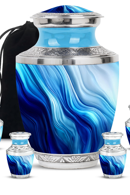 Cornflower Blue Blue Cremation Urn lifestyle display on memorial shelf - stylized abstract blue pattern with bold lines - memorial set with one large and four small urns