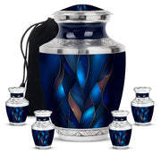 Soft Blue Blue Cremation Urn lifestyle display on memorial shelf - stylized abstract blue pattern with bold lines - memorial set with one large and four small urns