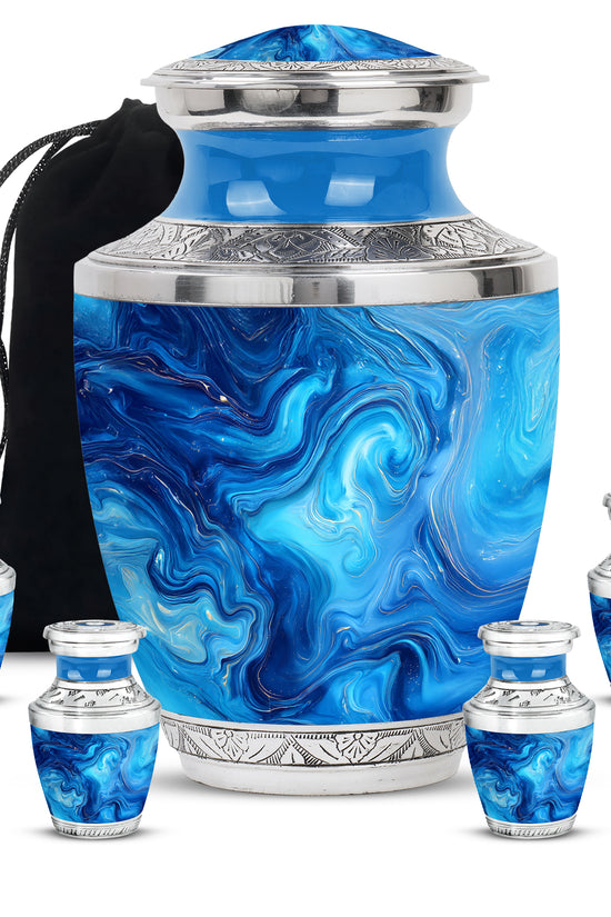 Cool Teal Blue Cremation Urn lifestyle display on memorial shelf - modern art-inspired blue motif on sleek aluminum - memorial set with one large and four small urns
