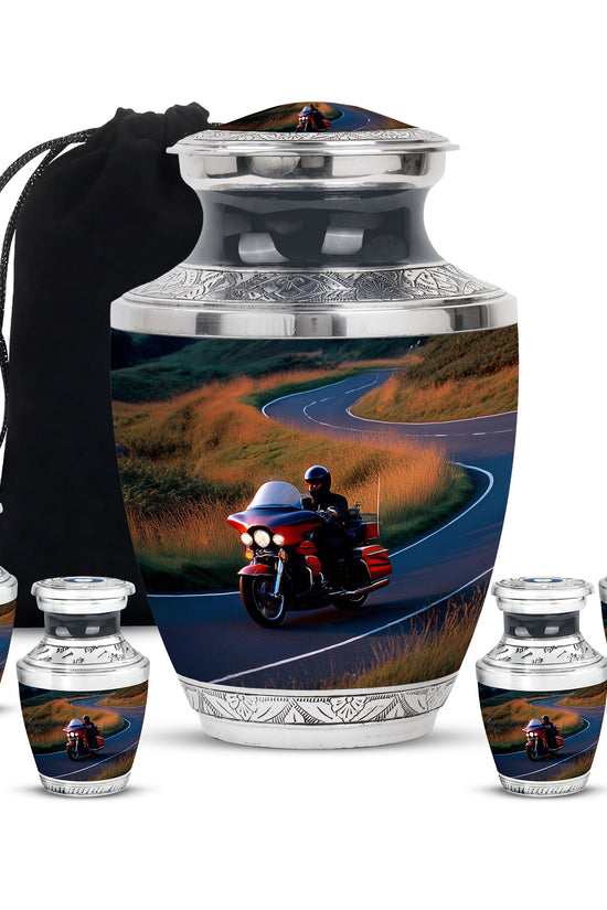 Sky Blue Bike Cremation Urn lifestyle display on memorial shelf - modern art-inspired bike motif on sleek aluminum - memorial set with one large and four small urns