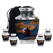 Sky Blue Bike Cremation Urn lifestyle display on memorial shelf - modern art-inspired bike motif on sleek aluminum - memorial set with one large and four small urns