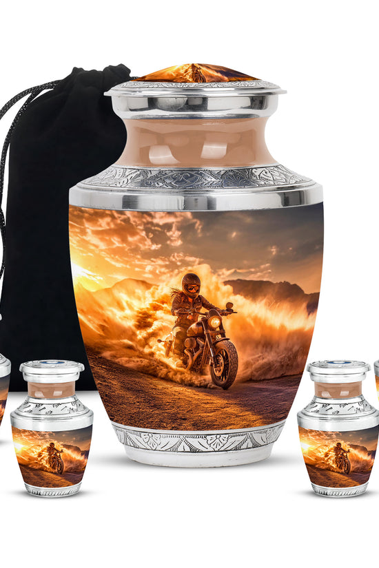 Warm Gold Bike Cremation Urn lifestyle display on memorial shelf - stylized abstract bike pattern with bold lines - memorial set with one large and four small urns