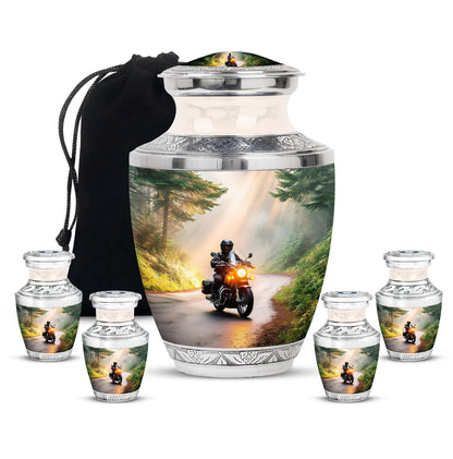 Warm Gold Bike Cremation Urn lifestyle display on memorial shelf - stylized abstract bike pattern with bold lines - memorial set with one large and four small urns