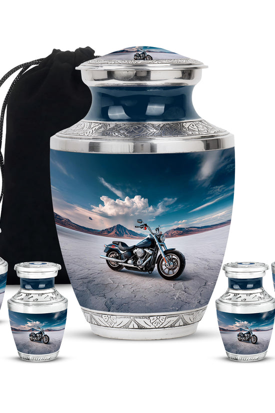 Indigo Bike Cremation Urn lifestyle display on memorial shelf - modern art-inspired bike motif on sleek aluminum - memorial set with one large and four small urns