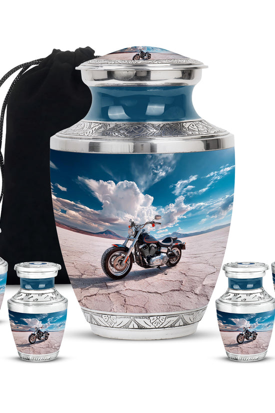 Sapphire Blue Bike Cremation Urn lifestyle display on memorial shelf - stylized abstract bike pattern with bold lines - memorial set with one large and four small urns