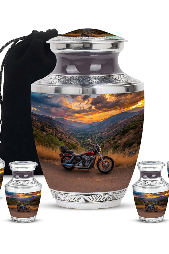 Celestial Blue Bike Cremation Urn lifestyle display on memorial shelf - modern art-inspired bike motif on sleek aluminum - memorial set with one large and four small urns