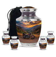 Celestial Blue Bike Cremation Urn lifestyle display on memorial shelf - modern art-inspired bike motif on sleek aluminum - memorial set with one large and four small urns