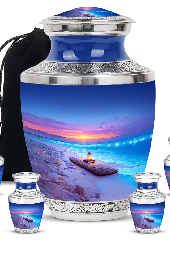 Royal Blue Beach Cremation Urn lifestyle display on memorial shelf - stylized abstract beach pattern with bold lines - memorial set with one large and four small urns