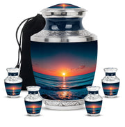 Slate Blue Beach Cremation Urn lifestyle display on memorial shelf - contemporary beach design with modern artistic flair - memorial set with one large and four small urns