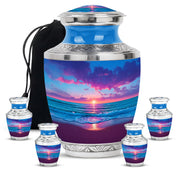 Dusty Blue Beach Cremation Urn lifestyle display on memorial shelf - modern art-inspired beach motif on sleek aluminum - memorial set with one large and four small urns