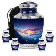 Vivid Blue Beach Cremation Urn lifestyle display on memorial shelf - stylized abstract beach pattern with bold lines - memorial set with one large and four small urns