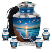 Sapphire Blue Beach Cremation Urn lifestyle display on memorial shelf - stylized abstract beach pattern with bold lines - memorial set with one large and four small urns