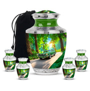 Hunter Green Car Cremation Urn lifestyle display on memorial shelf - stylized abstract car pattern with bold lines - memorial set with one large and four small urns