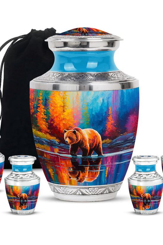 Sapphire Blue Bear Cremation Urn lifestyle display on memorial shelf - stylized abstract bear pattern with bold lines - memorial set with one large and four small urns