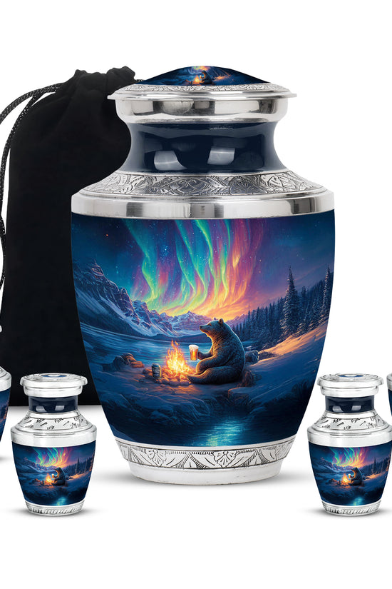 Slate Blue Bear Cremation Urn lifestyle display on memorial shelf - modern art-inspired bear motif on sleek aluminum - memorial set with one large and four small urns