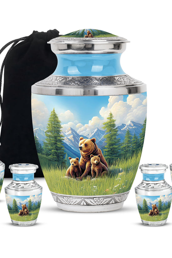 Slate Blue Bear Cremation Urn lifestyle display on memorial shelf - modern art-inspired bear motif on sleek aluminum - memorial set with one large and four small urns
