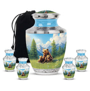 Slate Blue Bear Cremation Urn lifestyle display on memorial shelf - modern art-inspired bear motif on sleek aluminum - memorial set with one large and four small urns
