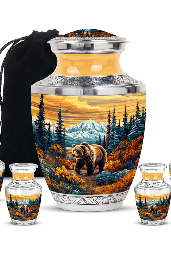 Sunrise Gold Bear Cremation Urn lifestyle display on memorial shelf - contemporary bear design with modern artistic flair - memorial set with one large and four small urns