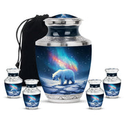 Dusty Blue Bear Cremation Urn lifestyle display on memorial shelf - modern art-inspired bear motif on sleek aluminum - memorial set with one large and four small urns