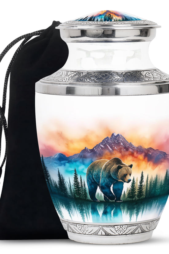 Chrome Silver Bear Cremation Urn side profile showing urn shape - stylized abstract bear pattern with bold lines - full-size 10 inch 200 cubic inch adult cremation urn