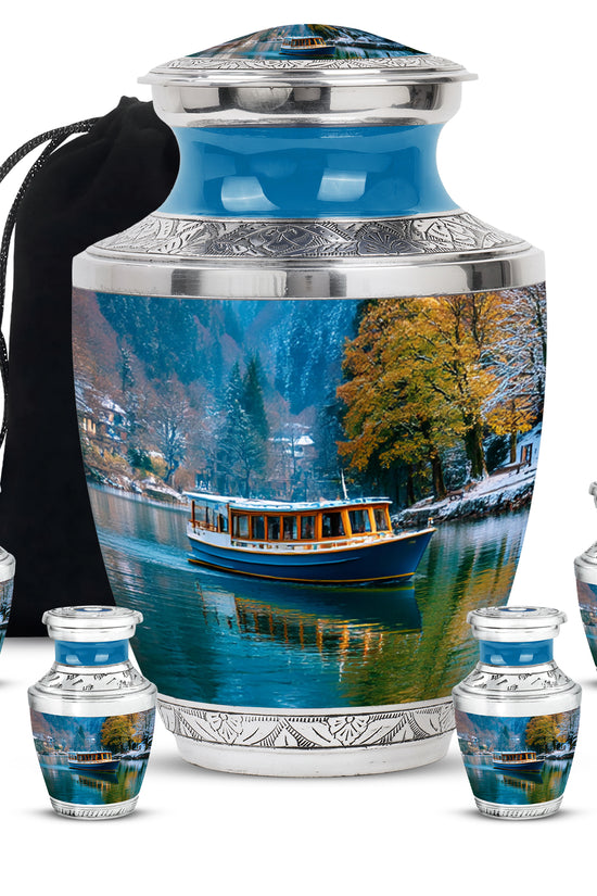 Twilight Blue Boat Cremation Urn lifestyle display on memorial shelf - artistic boat interpretation with creative detail - memorial set with one large and four small urns
