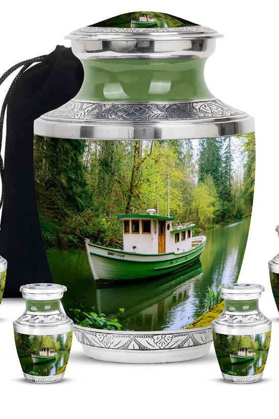Moss Green Boat Cremation Urn lifestyle display on memorial shelf - modern art-inspired boat motif on sleek aluminum - memorial set with one large and four small urns