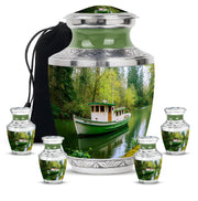 Moss Green Boat Cremation Urn lifestyle display on memorial shelf - modern art-inspired boat motif on sleek aluminum - memorial set with one large and four small urns