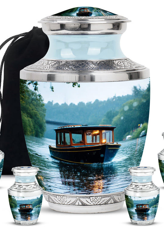 Cloud White Boat Cremation Urn lifestyle display on memorial shelf - stylized abstract boat pattern with bold lines - memorial set with one large and four small urns