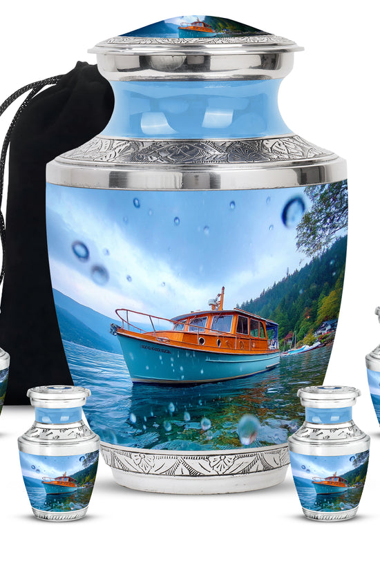 Celestial Blue Boat Cremation Urn lifestyle display on memorial shelf - modern art-inspired boat motif on sleek aluminum - memorial set with one large and four small urns