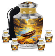 Burnished Gold Boat Cremation Urn lifestyle display on memorial shelf - stylized abstract boat pattern with bold lines - memorial set with one large and four small urns