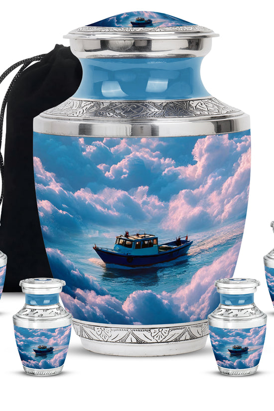Sapphire Blue Boat Cremation Urn lifestyle display on memorial shelf - stylized abstract boat pattern with bold lines - memorial set with one large and four small urns