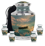 Rich Black Boat Cremation Urn lifestyle display on memorial shelf - contemporary boat design with modern artistic flair - memorial set with one large and four small urns