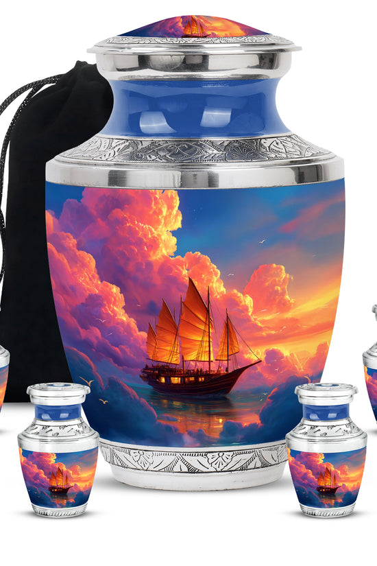 Royal Blue Boat Cremation Urn lifestyle display on memorial shelf - stylized abstract boat pattern with bold lines - memorial set with one large and four small urns