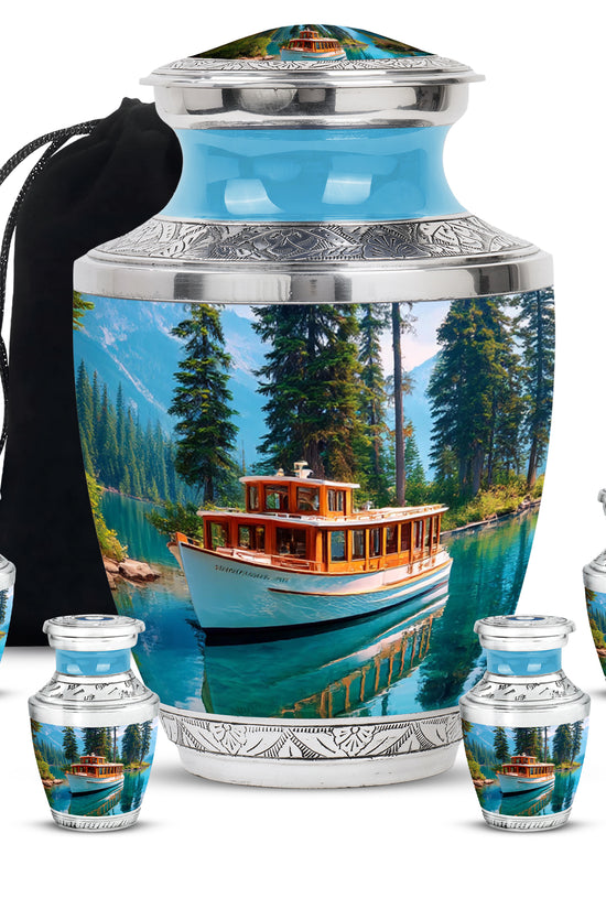 Vivid Blue Boat Cremation Urn lifestyle display on memorial shelf - stylized abstract boat pattern with bold lines - memorial set with one large and four small urns