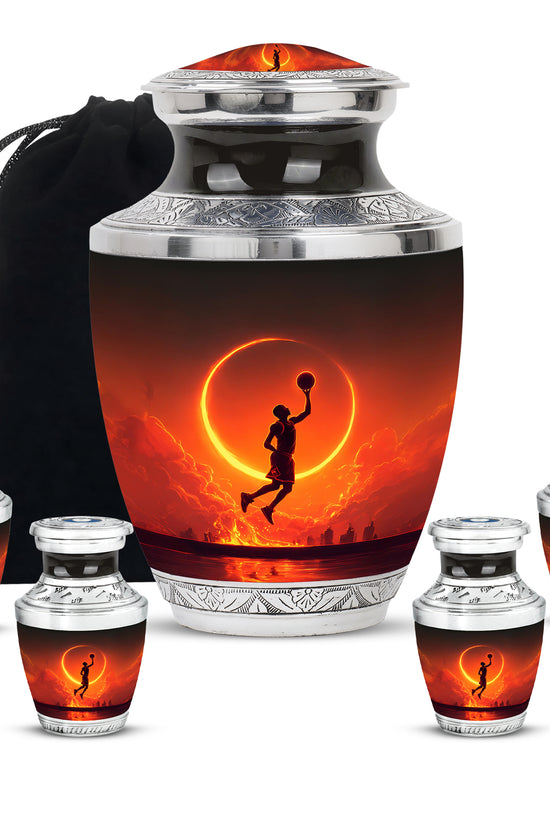 Jet Black Basketball Cremation Urn lifestyle display on memorial shelf - modern art-inspired basketball motif on sleek aluminum - memorial set with one large and four small urns