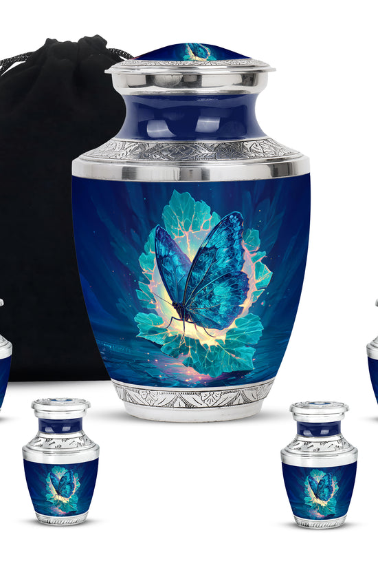 Dusty Blue Butterfly Cremation Urn lifestyle display on memorial shelf - modern art-inspired butterfly motif on sleek aluminum - memorial set with one large and four small urns