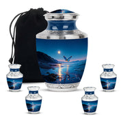 Slate Blue Butterfly Cremation Urn lifestyle display on memorial shelf - contemporary butterfly design with modern artistic flair - memorial set with one large and four small urns